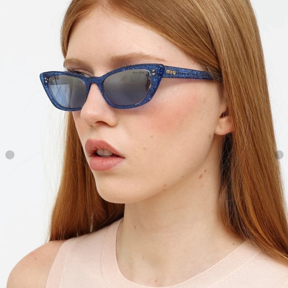 Miu miu Cat eye Sunglasses